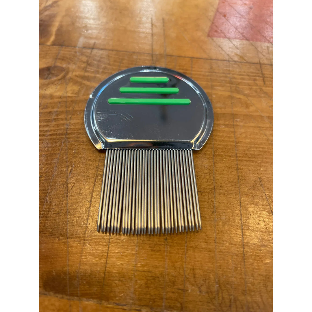 Top-down view of 239 Fiber Brush with chrome head and green slots