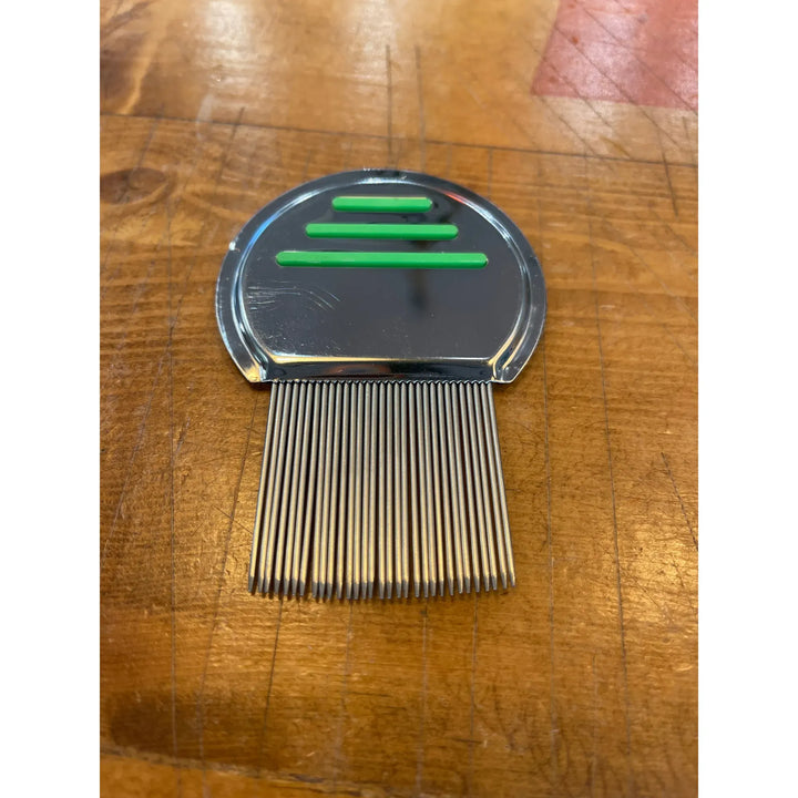 Top-down view of 239 Fiber Brush with chrome head and green slots
