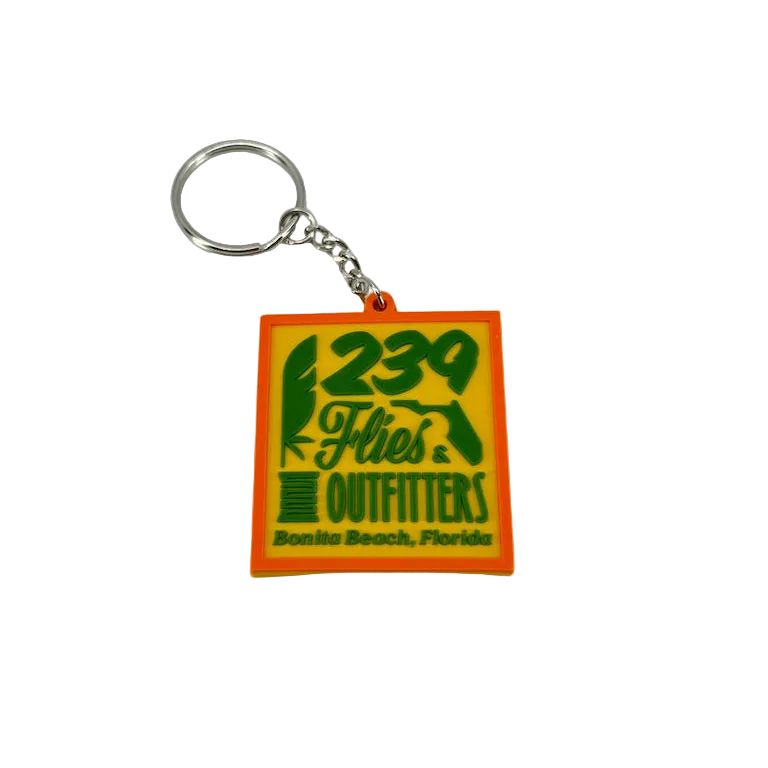 Orange and yellow rubber keychain with &