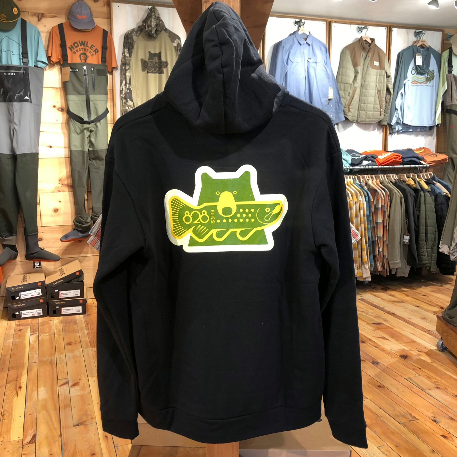 Back view of black 828 Zip Hoody featuring large green and yellow fish graphic
