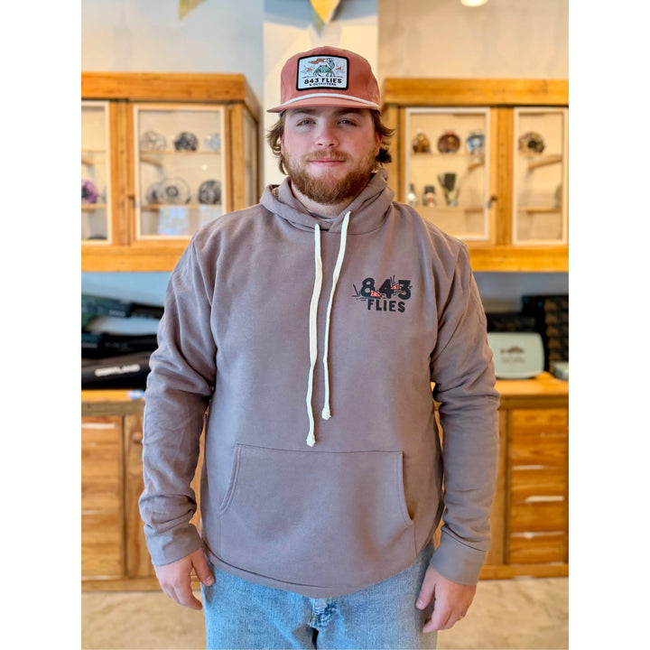 Front fit of 843Flies Sweatshirt Hoodie in Shiitake color with kangaroo pocket and stylized fishing rod logo