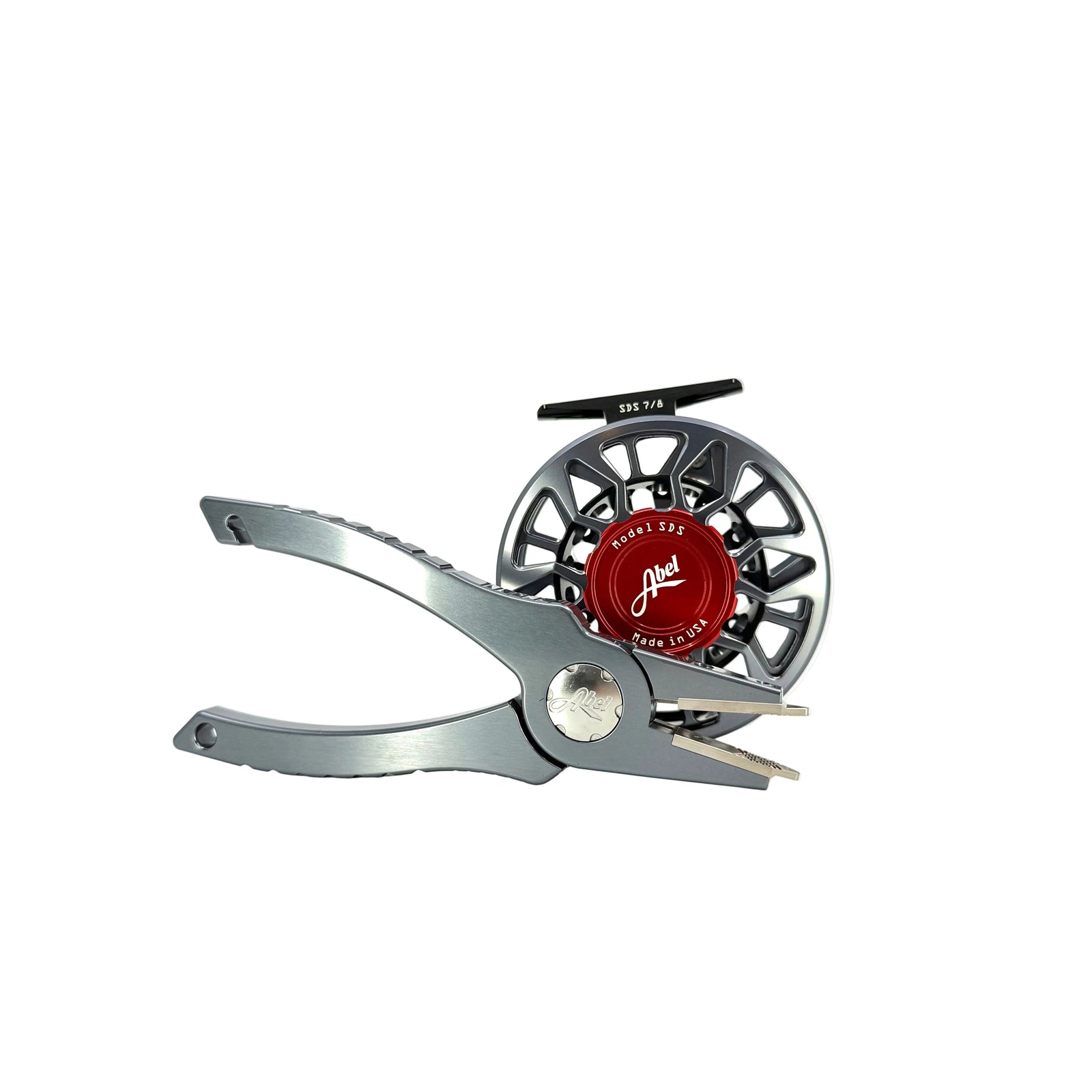 Abel SDS 7/8 Slate Grey fly reel with red drag knob and matching pliers