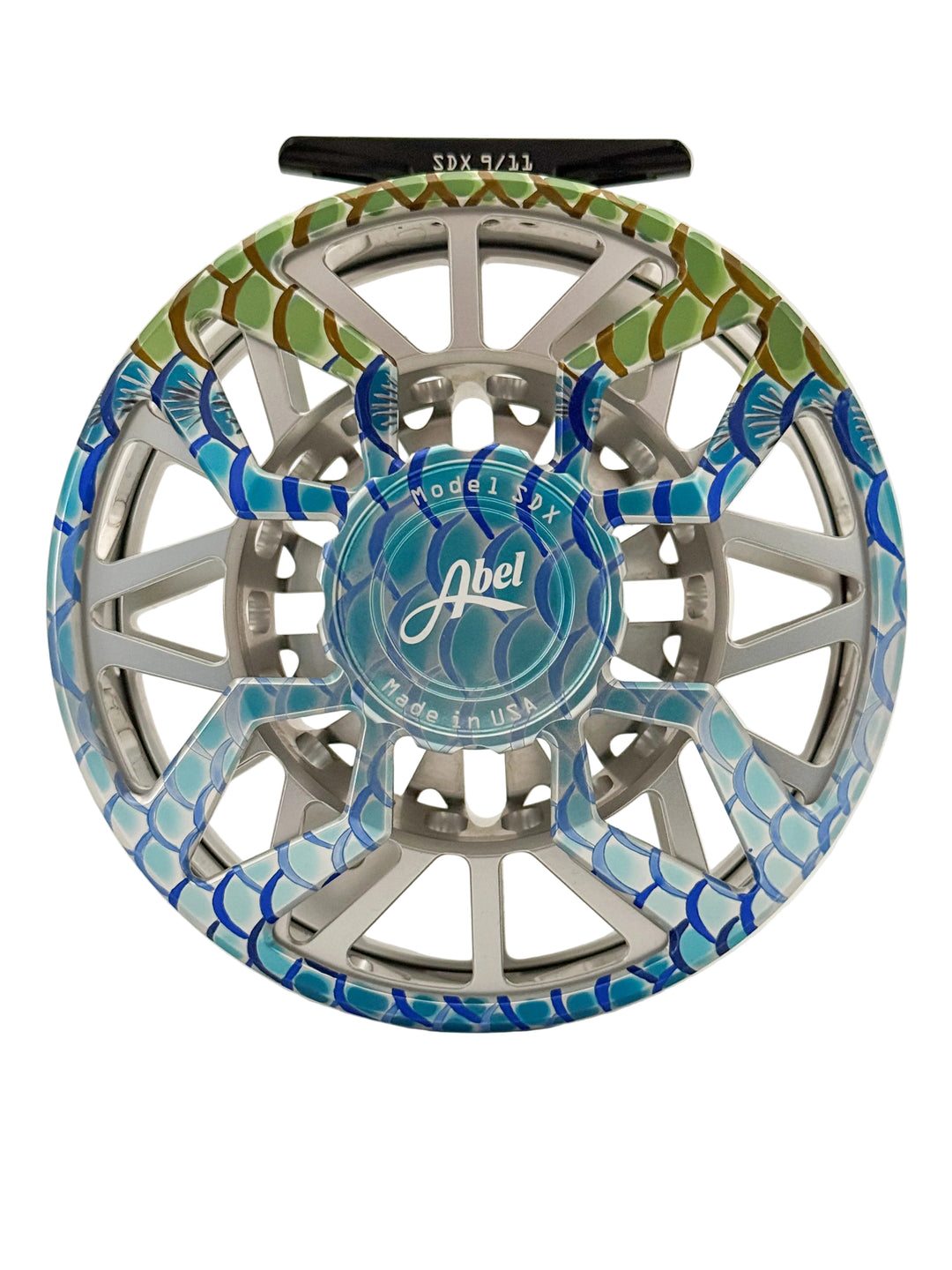 Front view of Abel SDX 9/11 fly reel showing blue drag knob and tarpon scale finish