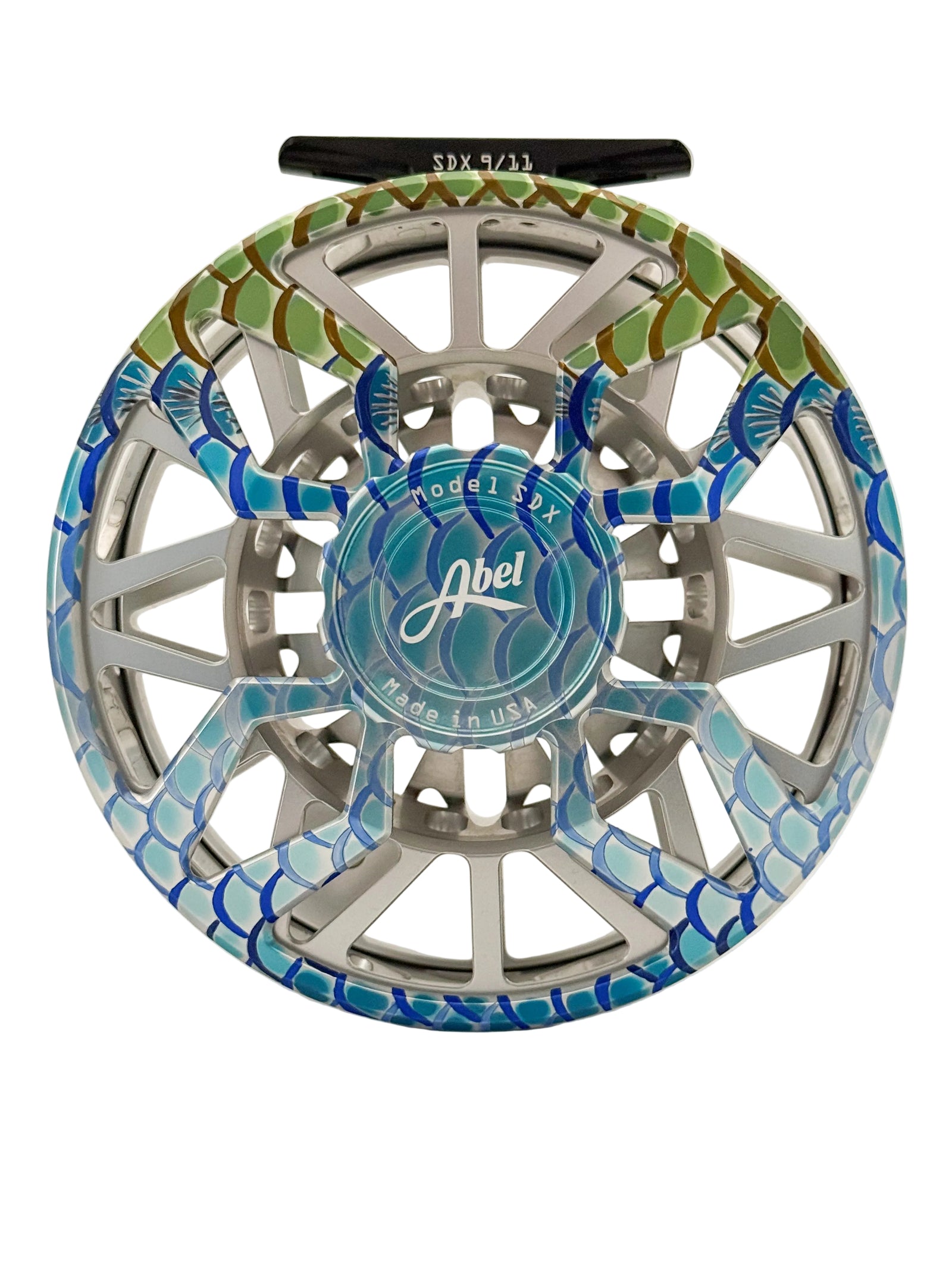 Front view of Abel SDX 9/11 fly reel showing blue drag knob and tarpon scale finish