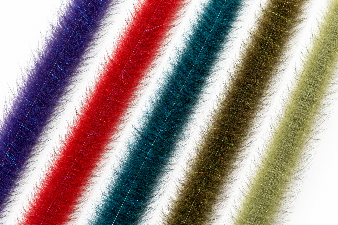 Assorted colors EP Foxy Brush fly tying materials including purple, red, and teal