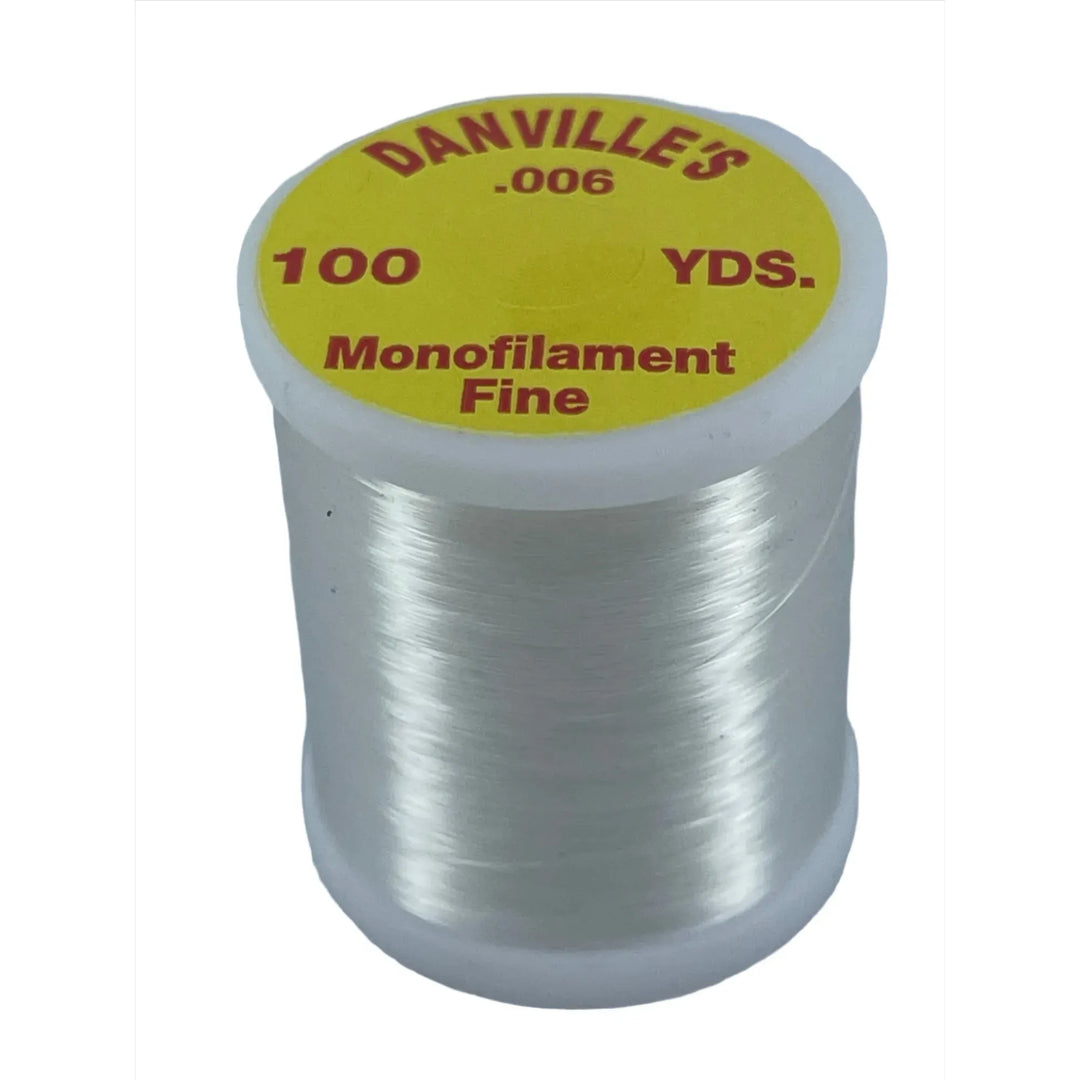 Danville .006 Monofilament Thread spool with yellow label for fly tying