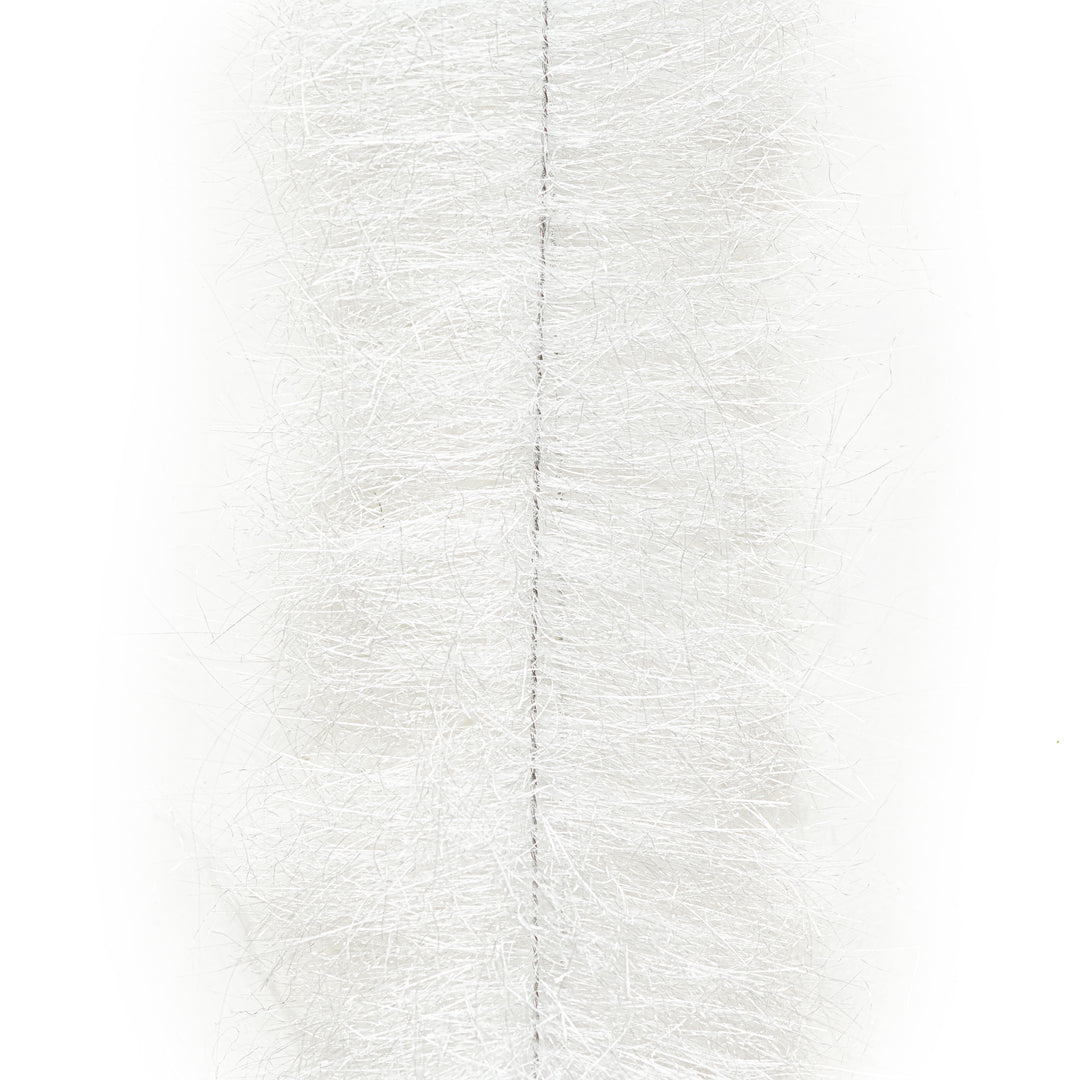 White EP fiber brush for flies showing stainless steel wire core