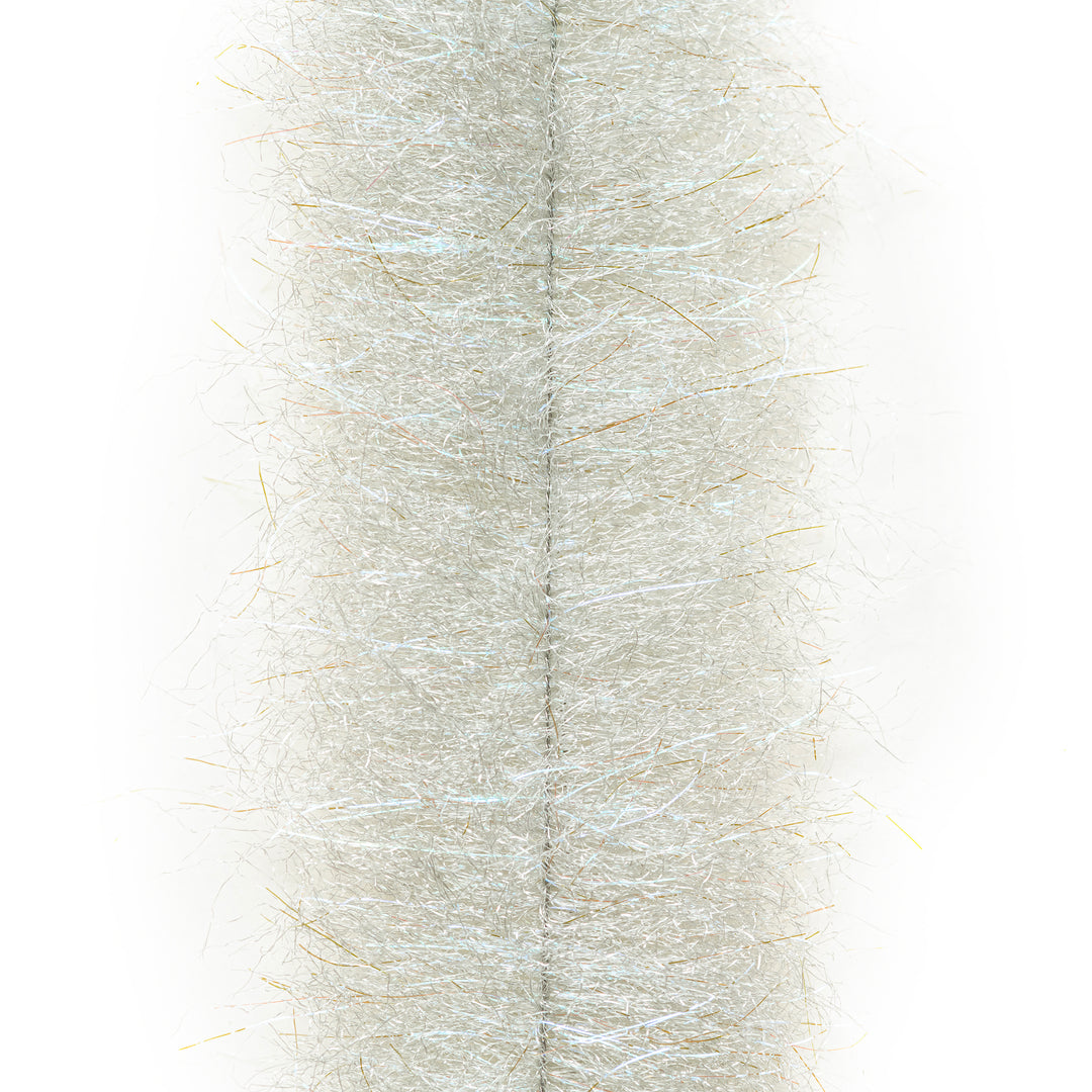 Close-up of EP Articulated Brush with iridescent blue and gold sparkle fibers on stainless steel core