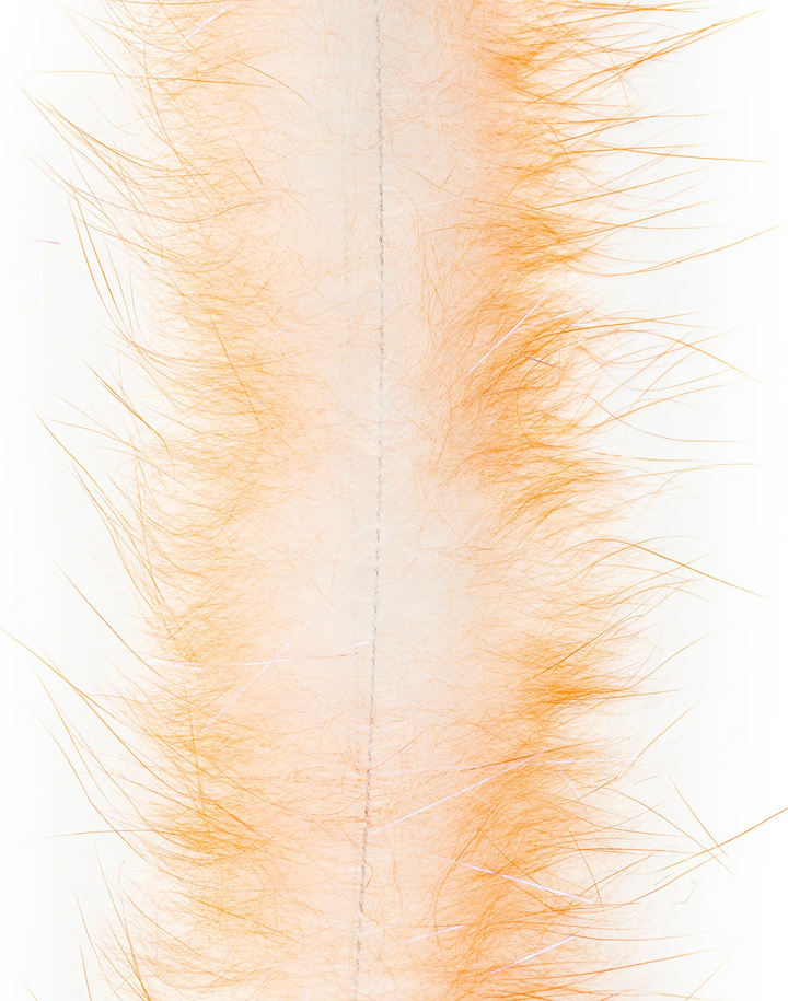 Pale apricot EP Bunny Brush with semi-translucent underfur and clear synthetic mix
