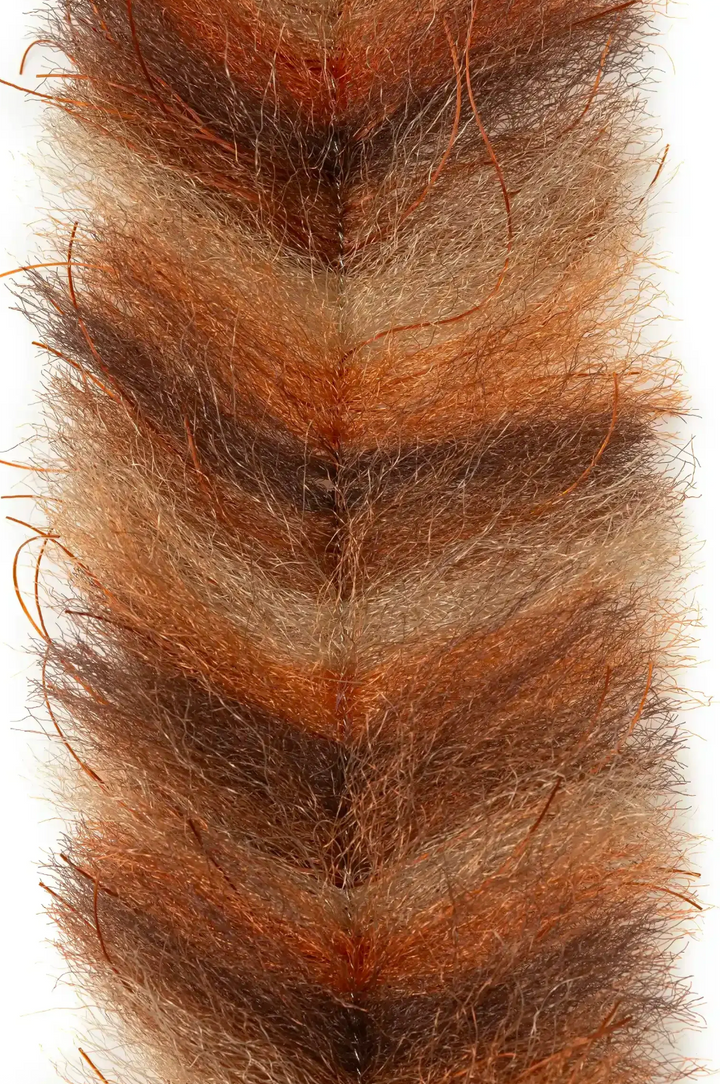 Rust-orange and dark brown curly brush strip with copper strands for dense baitfish heads