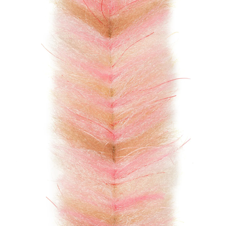 Pink and tan fly tying brush with bright micro legs for attracting bonefish and permit