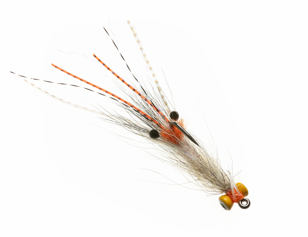 Enrico Puglisi Spawning Shrimp fly with yellow lead eyes and orange thread collar