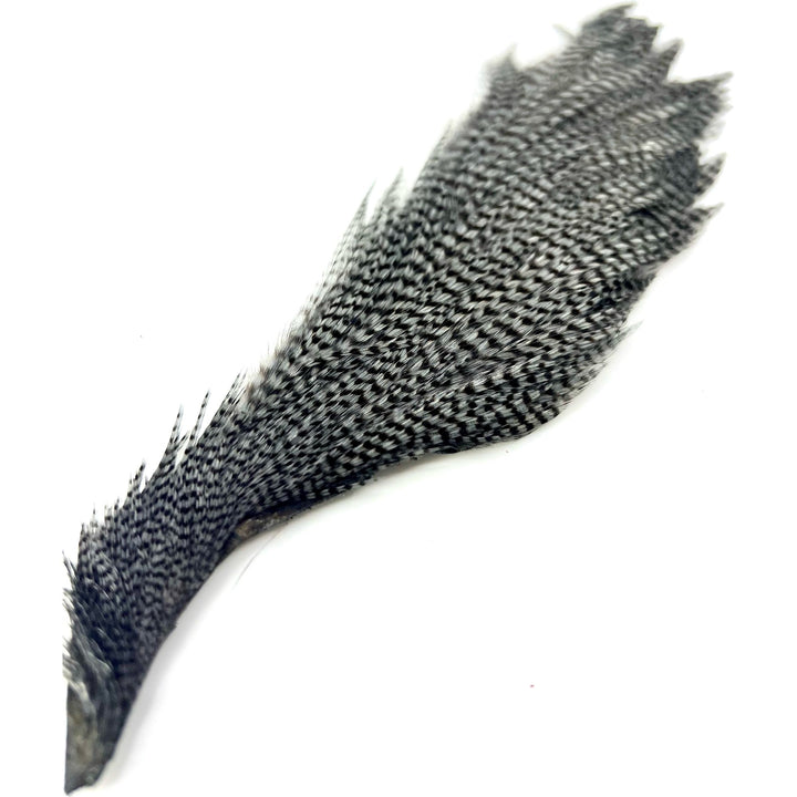 Classic black and white grizzly pattern half cape fly tying feather