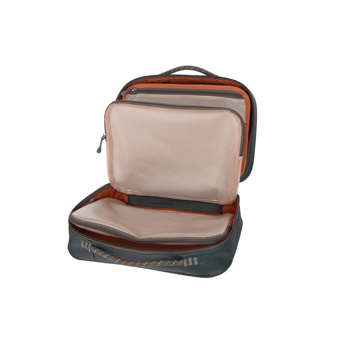 Open Fishpond Backwater fly tying kit displaying dual rust-orange lined compartments and mesh organization