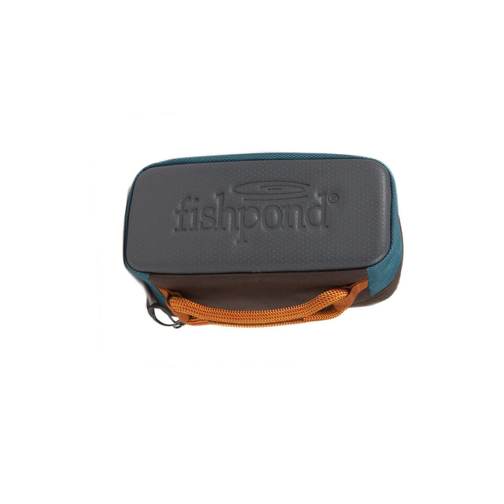 Bottom view of Fishpond Ripple Reel Case with molded base and orange carry handle