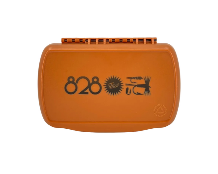 Bottom of Fishpond Tacky Series fly box showing 828 Flies branding and hook graphic