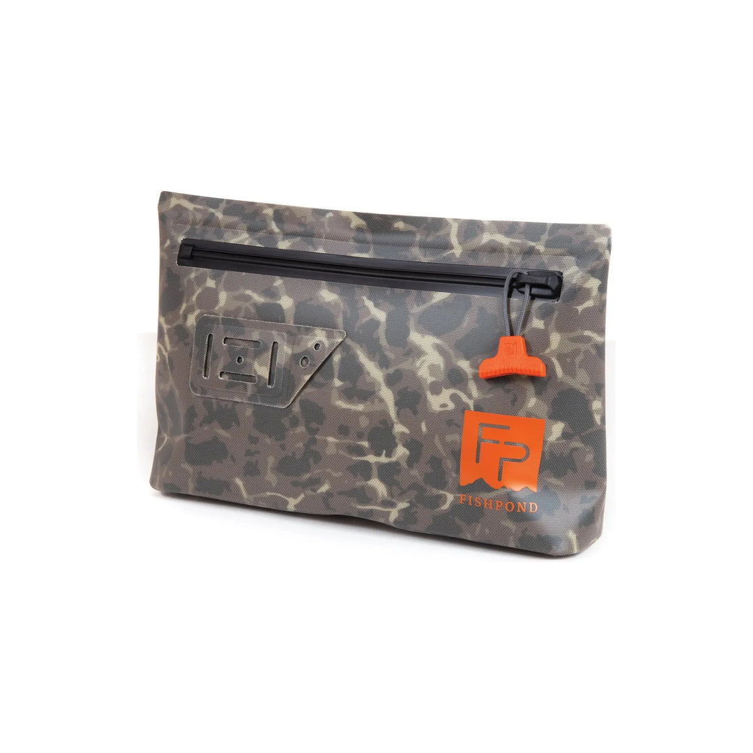 Fishpond Thunderhead waterproof pouch with camouflage pattern and orange zipper pull