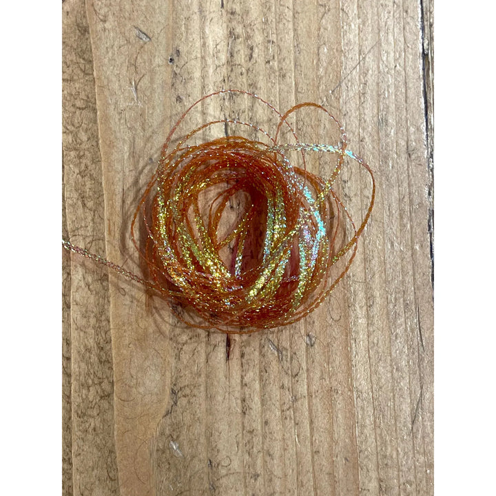 Hareline Flat Diamond Braid amber orange with gold flash for bonefish fly tying