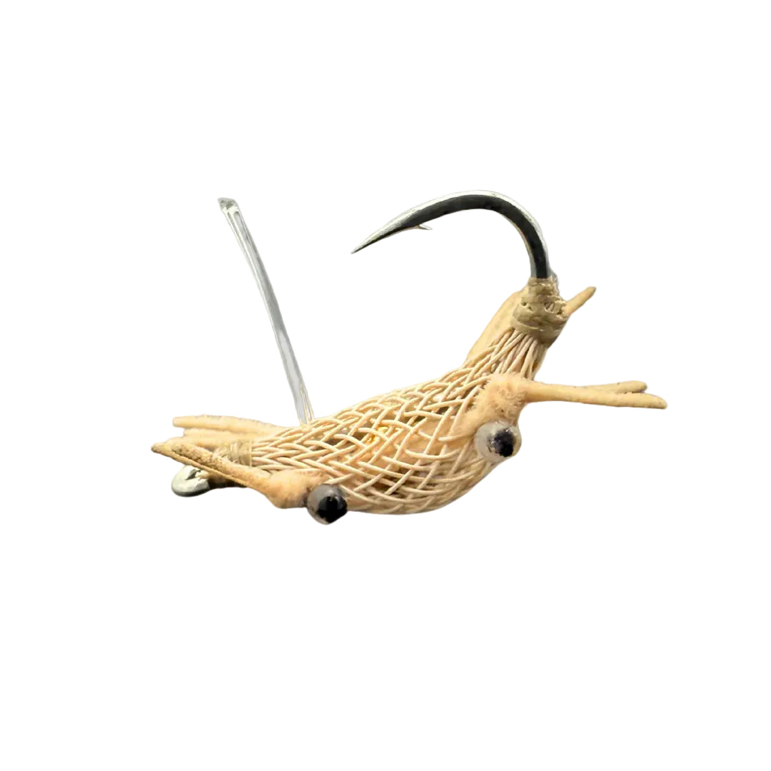 Tan Alphlexo Crab fly fishing lure with segmented body tubing and tungsten beads