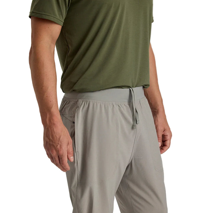 Close-up of Free Fly jogger waistband, drawstring, and zippered hip pocket detail