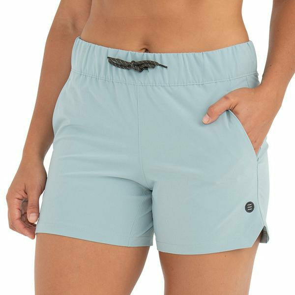 Light blue Free Fly women's athletic shorts with logo patch