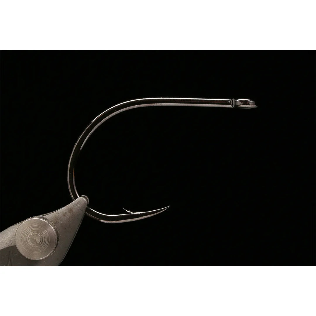 Macro view of Kona black-nickel barbed point and straight eye hook