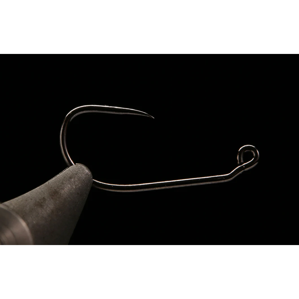 Close-up of Kona barbless jig hook with wide gap, ultra-sharp point, and angled eye