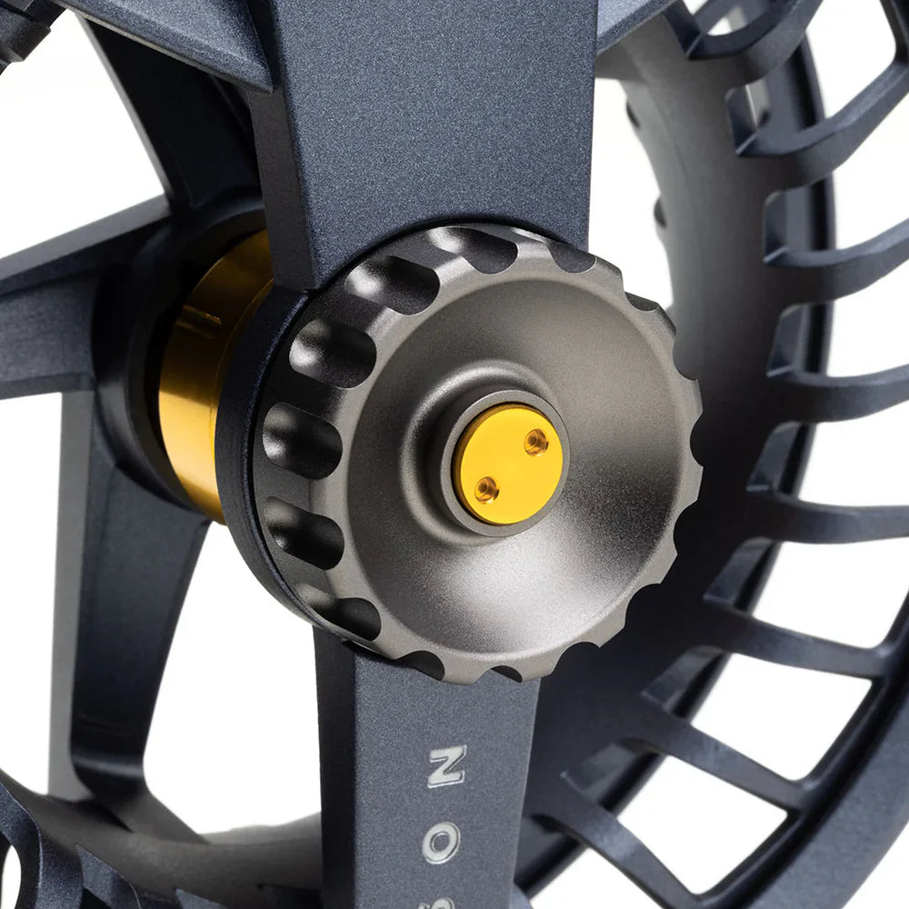 Close-up of Cobalt Drag System cone on Lamson Liquid MAX fly reel with scalloped edges