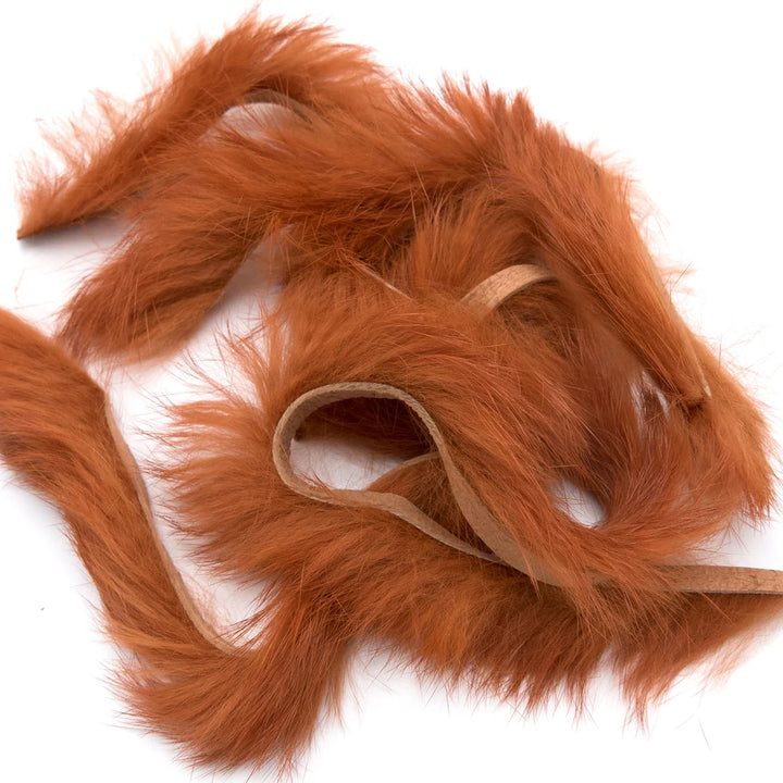Close-up of rust-colored Magnum Rabbit Strips showing soft fur