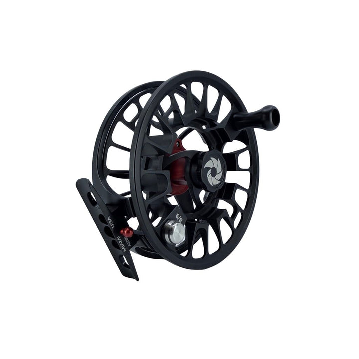 Side view of Nautilus GTR fly reel showing matte black finish and red accents