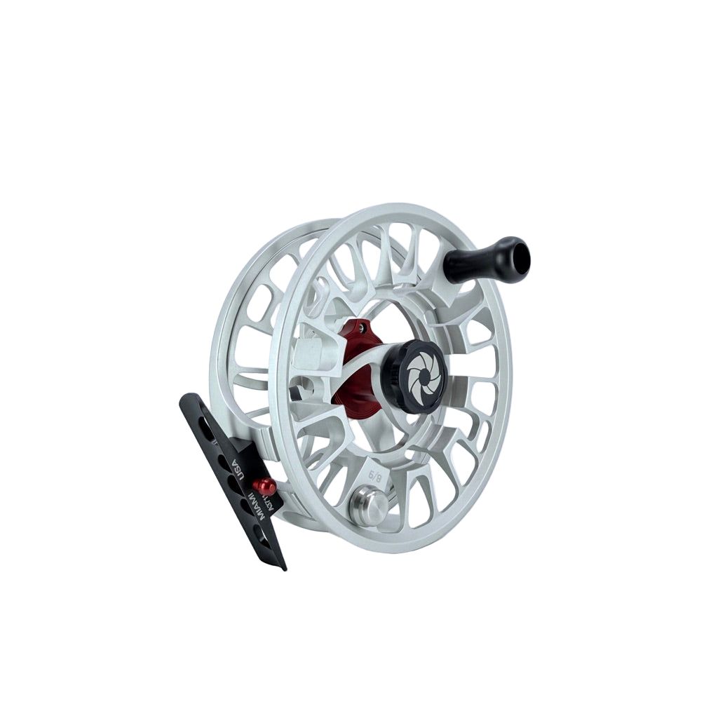 Side view of Nautilus GTR 8/9 fly reel showing red drive hub and ergonomic handle