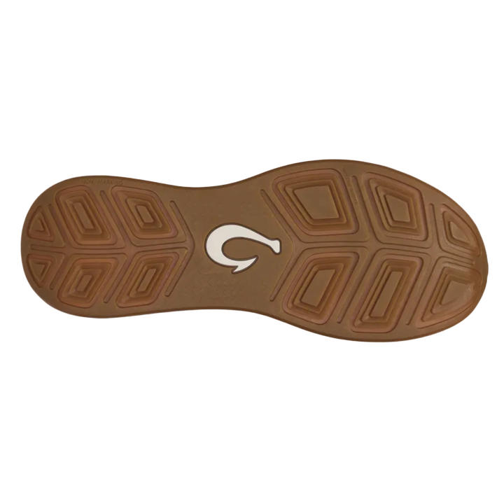 Gum rubber outsole of Olukai Ahi water shoes showing fish hook logo traction