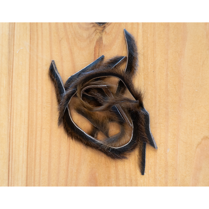 Natural tan and brown pine squirrel zonker strip detail