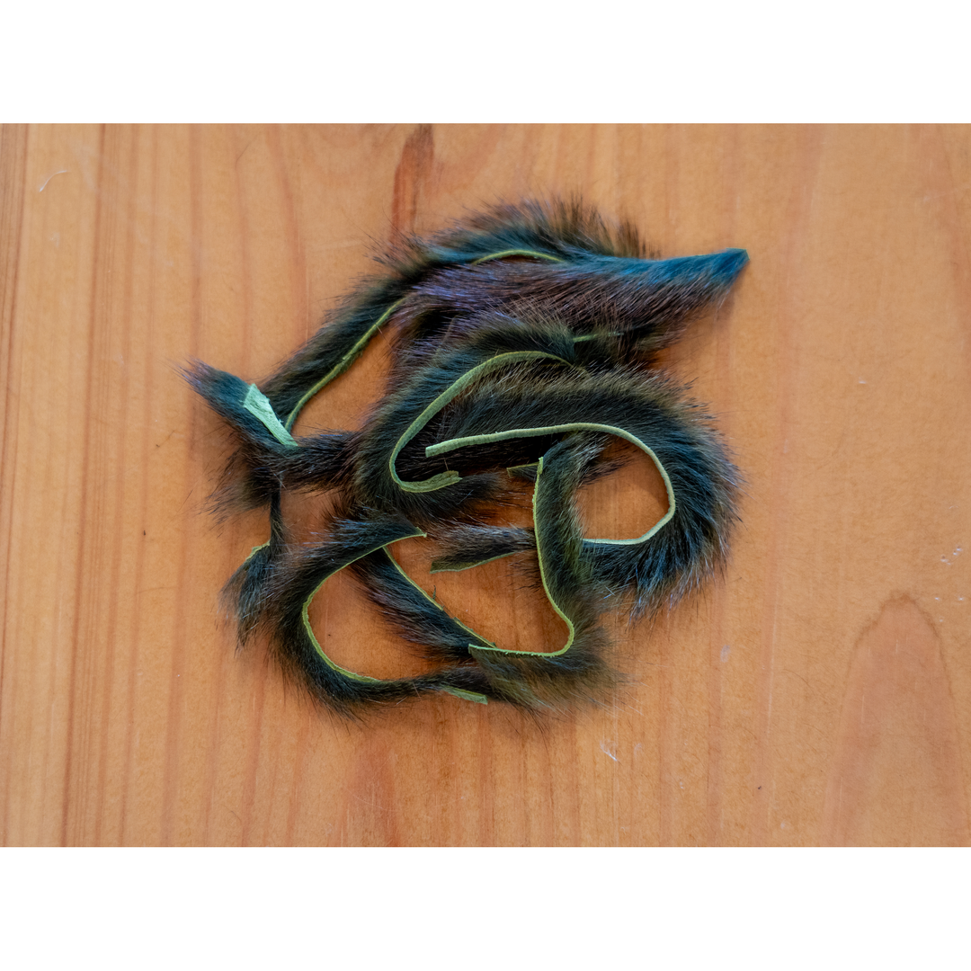 Olive green tinged dark squirrel fur zonker strip