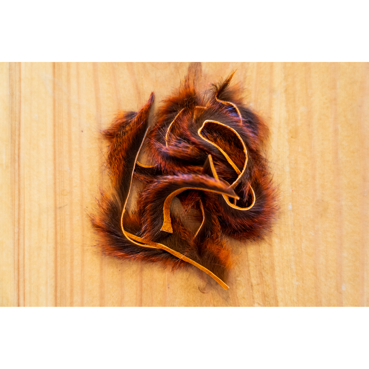 Copper and chestnut reddish-brown squirrel zonker strip