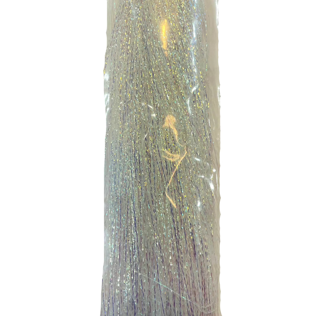 Sealed Hareline Polar Flash silver-white fly tying material with blue and gold highlights