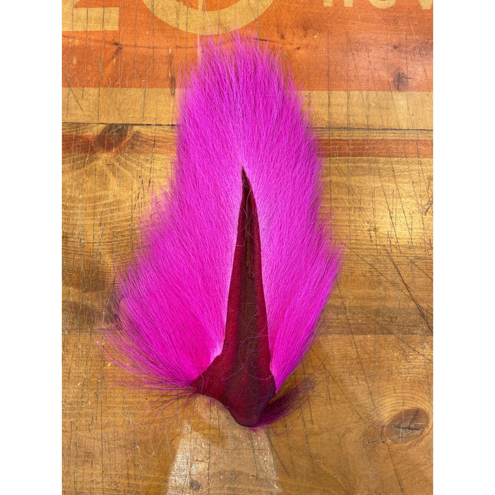 Bright magenta-pink Prime Buck Tail hair strip for fly tying