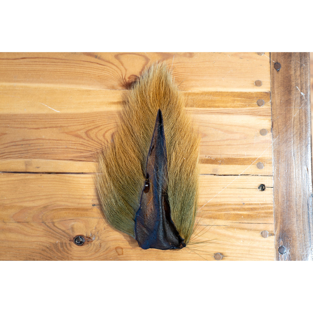Natural brown and olive buck tail hair for fly tying