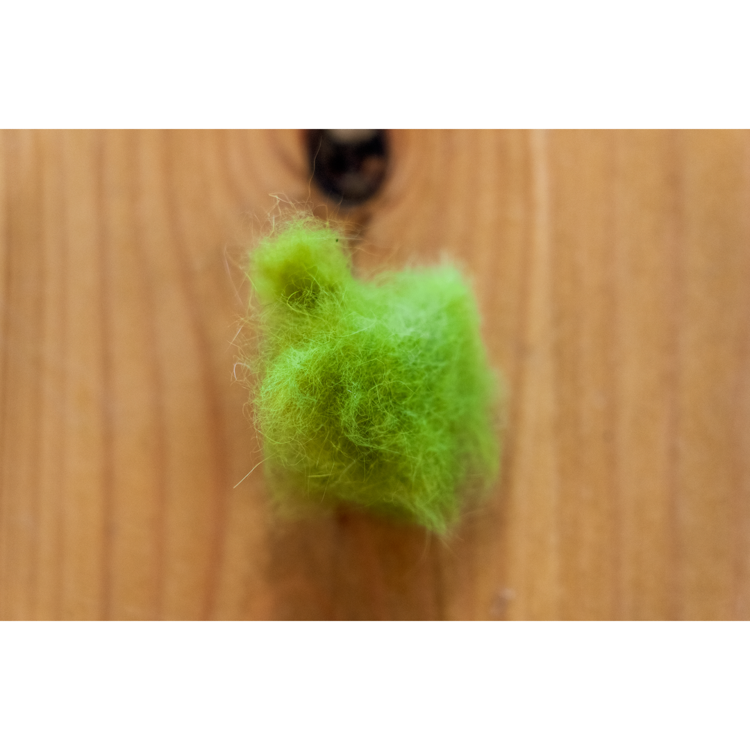 Vibrant lime green rabbit dubbing macro texture