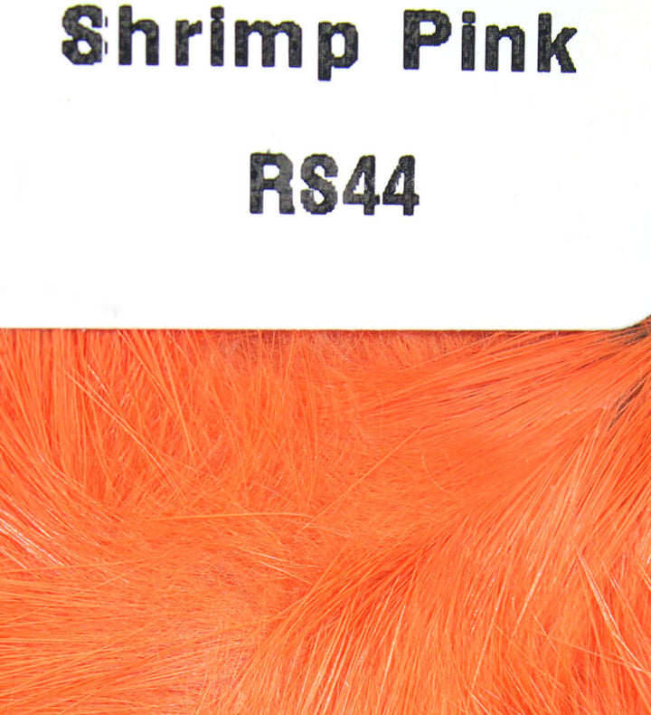 Shrimp pink rabbit fur strip close-up with product tag RS44