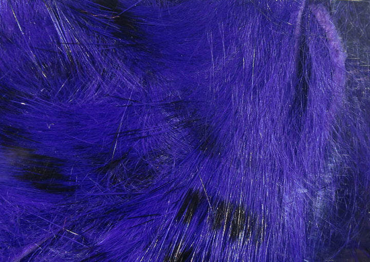 Deep purple violet dyed rabbit strip fly tying material with smooth glossy fibers