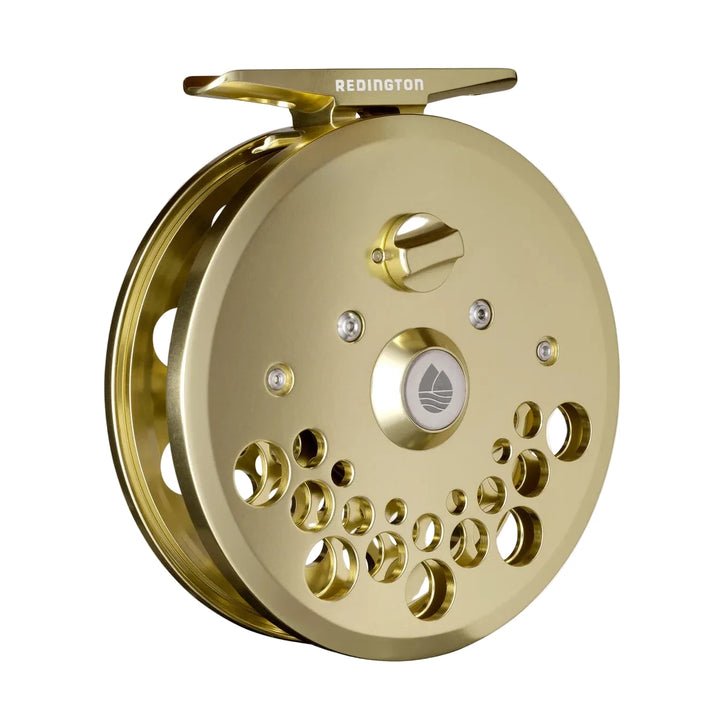 Gold Redington Classic Trout fly reel featuring brushed metallic faceplate