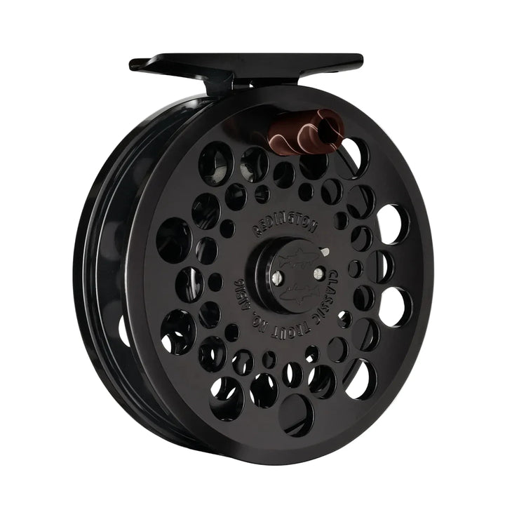 Redington Classic Trout No. 4/4W fly reel with shark logo and cork handle