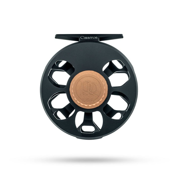 Close-up of Ross Cimarron reel showing copper USA medallion and eight-spoke design