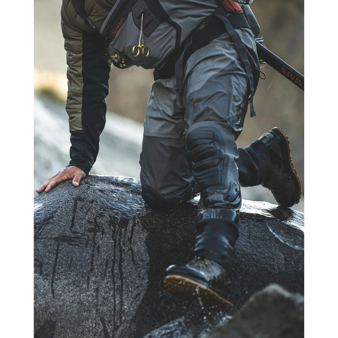 Simms Confluence Waders reinforced knee detail in wet conditions
