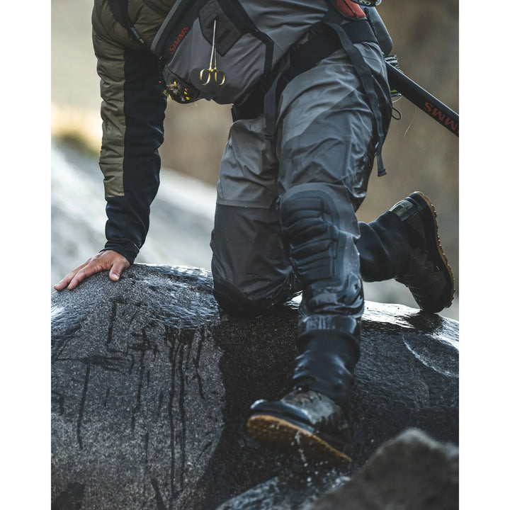 Simms Confluence Waders reinforced knee detail in wet conditions