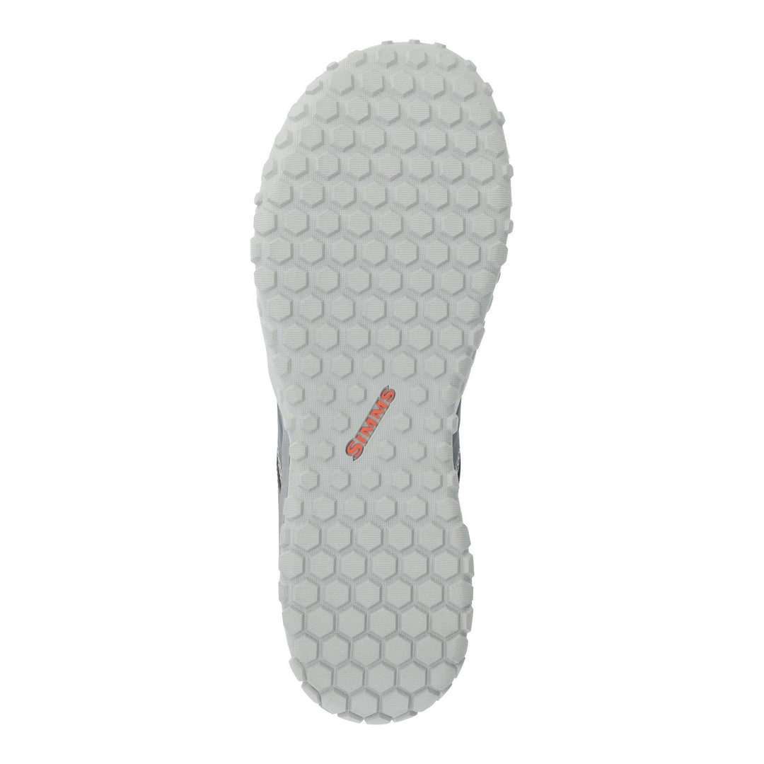 Simms Pursuit Shoe hexagonal traction outsole bottom view with orange branding