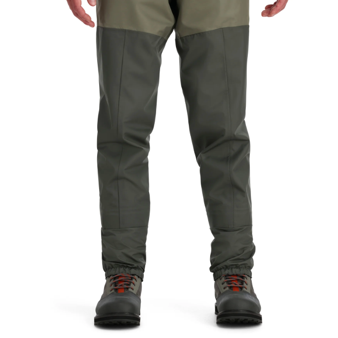 Simms Tributary stockingfoot waders with elastic ankle cuffs over boots