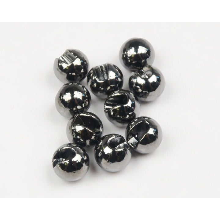 Shiny metallic silver slotted tungsten beads close-up