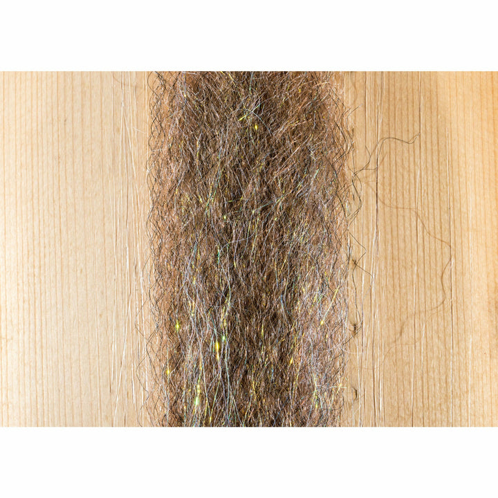 Brownish-grey wiry fly tying material with yellow-green metallic flecks